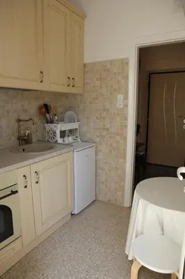 a kitchen with a sink and a dishwasher at Olga's Studio in Athens