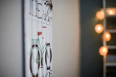 a white refrigerator with magnets on it in a room at Your 