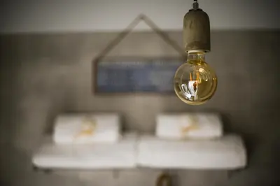 a light hanging from the ceiling of a room at Your 
