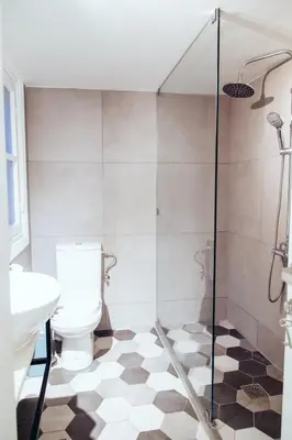 a bathroom with a toilet and a shower at we saw athens in Athens