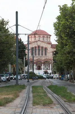 a building on a street with cars parked in front at Unique Flat with Sea View at Edem Beach - A Seafront Property by Athenian Homes in Athens