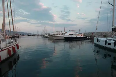 a group of boats are docked in a harbor at Unique Flat with Sea View at Edem Beach - A Seafront Property by Athenian Homes in Athens