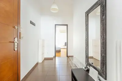 a bathroom with a mirror and a black sink at Apartment in the Middle of Everything in Athens