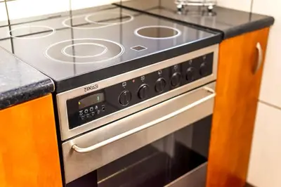 a stove top oven sitting in a kitchen at Apartment in the Middle of Everything in Athens