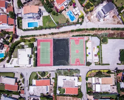 an aerial view of a house with a basketball court at Analisa Luxury Villa in Sounio