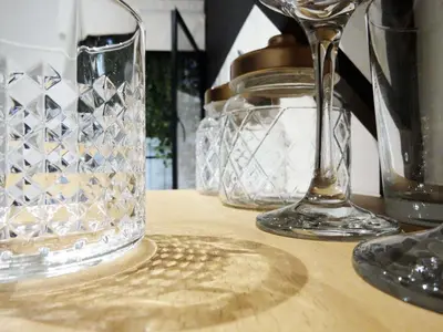 a table with two glasses and a wine glass at The CucuWow in Athens