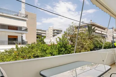 a balcony with a view of buildings at Holiday Apartment Glyfada in Athens