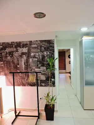 a hallway with a wall mural of a city at Luxurious Loft with Garden in Athens