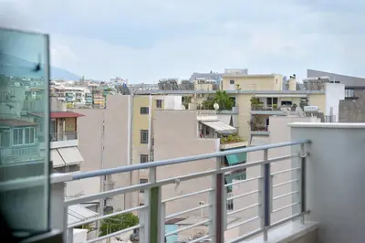 a view of a city from a balcony at Alekos Apartments 1 - Νetflix & Comfort in Athens