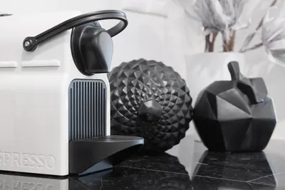 a hair brush and a pineapple on a counter at Lux Central Apt at Kolonaki Area in Athens