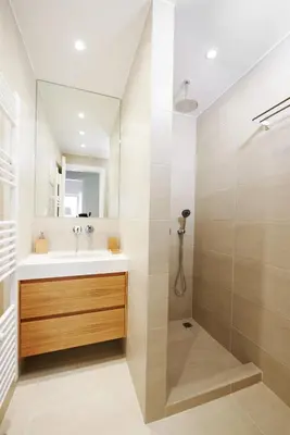 a bathroom with a sink and a mirror at Lux Central Apt at Kolonaki Area in Athens