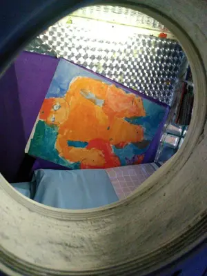 a reflection of a painting of a bear on a floor at Athens centre diamond in Athens
