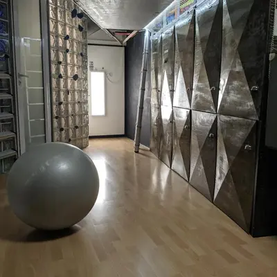 a room with a large exercise ball on the floor at Athens centre diamond in Athens