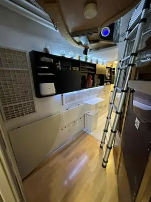 a room with a kitchen with a ladder in it at Athens centre diamond in Athens