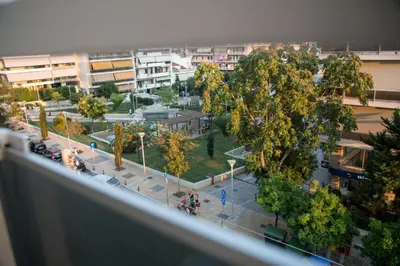 an overhead view of a street with trees and buildings at The Grove House in Athens