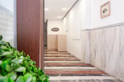 a corridor in a building with a hallway at Athens Connection Apartments in Athens