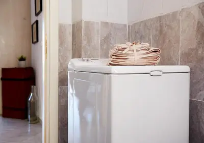 a stack of napkins on top of a refrigerator at Boutique52 Luxury Apartments in Athens