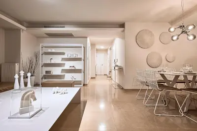 a dining room with a table and chairs and a dining room at Grystal Green Properites in Athens
