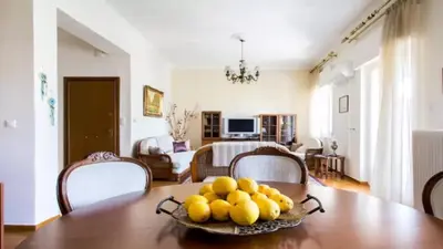a bowl of fruit on a table in a living room at Large 3 bedroom Apt with Terrace in Athens