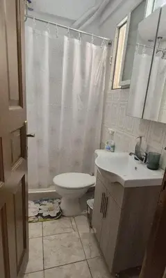 a bathroom with a toilet and a sink at •Budget travellers •Great location in Athens