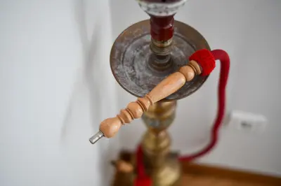 a close up of a hook up to a lamp at Athens Squared Apartments in Athens