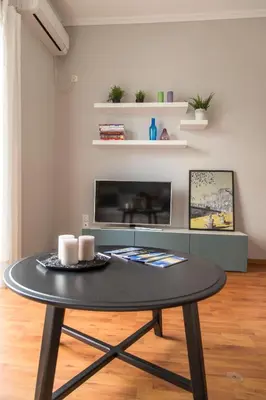 a black coffee table in a living room at Gazi Discrit Next To Subway in Athens