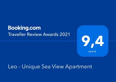 a blue box with the text travel review awards at Leo - Unique Glyfada Apartment in Athens