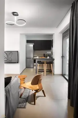 a living room with a couch and a table at Elysium Boutique Apartments in Athens