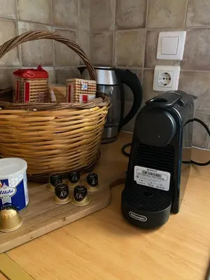 a toaster sitting on a counter next to a basket at The Little Studio Koukaki - Acropolis in Athens