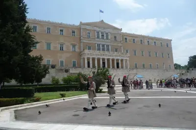 a group of people on skateboards in front of a building at The Little Prince in Plaka in Athens