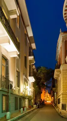 an empty street in a city at night at Hapimag Apartments Athens in Athens