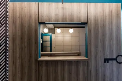 a bathroom with a mirror and a mirror at Nubian Hostel in Athens