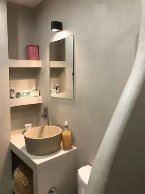 a bathroom with a bowl sink and a toilet at 5th floor bright flat at bohemian Exarcheia in Athens