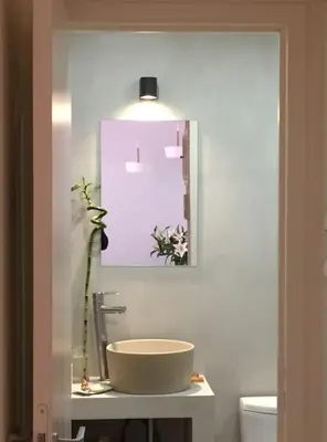 a bathroom with a sink and a mirror at 5th floor bright flat at bohemian Exarcheia in Athens