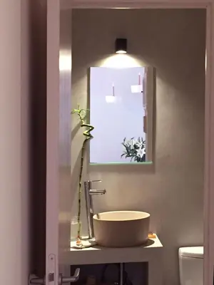 a bathroom with a sink and a mirror at 5th floor bright flat at bohemian Exarcheia in Athens