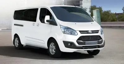 a white van parked in a parking lot at Elite Downtown Central 5th Floor Apartment in Athens