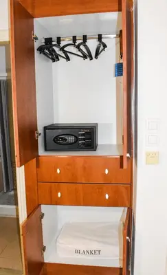 a kitchen with a stove top oven in a cabinet at Acqua Marina - Άκουα Μαρίνα in Agia Marina Aegina