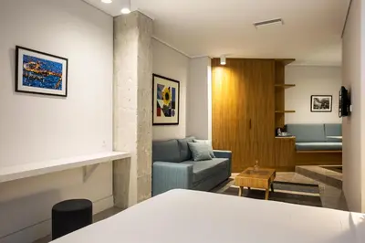 a living room with a couch and a table at Vol.5 in Athens