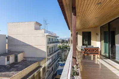 a balcony of a building with a bench on it at Acropolis View apartment 120sqm in Athens