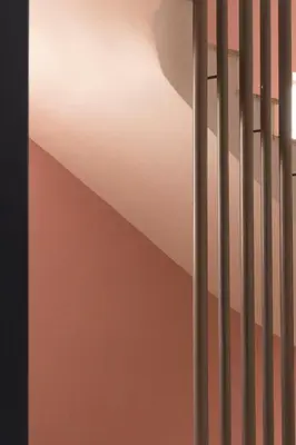 a stairwell with a wall and a stair railing at Art Suites Athens in Athens