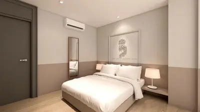 a bedroom with a white bed and a mirror at Great Living Apartments in Athens