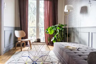 a living room with a couch and a window at Agora Vista Acropolis in Athens