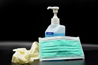 a mask and a bottle of mouthwash on a table at Athens Edition Guesthouse in Athens