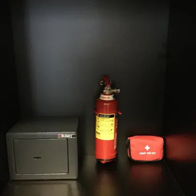 a red fire hydrant sitting next to a box at Athens Edition 2.0 in Athens