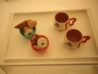 three cups of coffee and cookies on a tray at Charming Studio Posh Quartier (Kolonaki Athens) in Athens