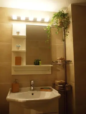 a bathroom with a sink and a mirror at Charming Studio Posh Quartier (Kolonaki Athens) in Athens