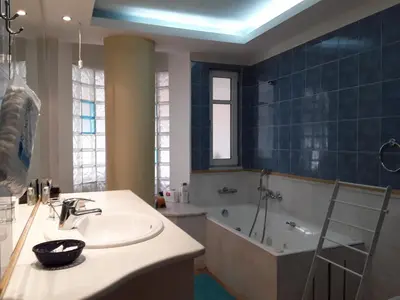 a bathroom with a sink and a bath tub at Best Point To Stay in Athens