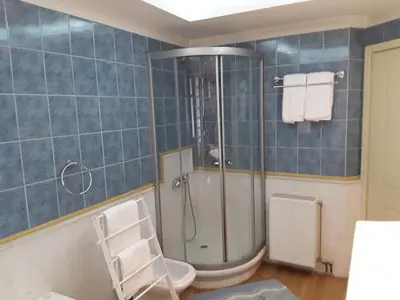 a bathroom with a shower and a toilet at Best Point To Stay in Athens