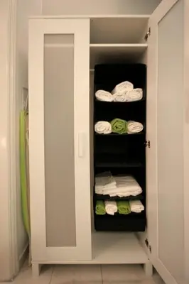 a walk in closet with towels and towels at Luxury flat in Kolonaki, 3’ Metro in Athens