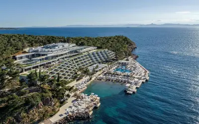 an aerial view of a resort on the ocean at Four Seasons Astir Palace Hotel Athens in Athens